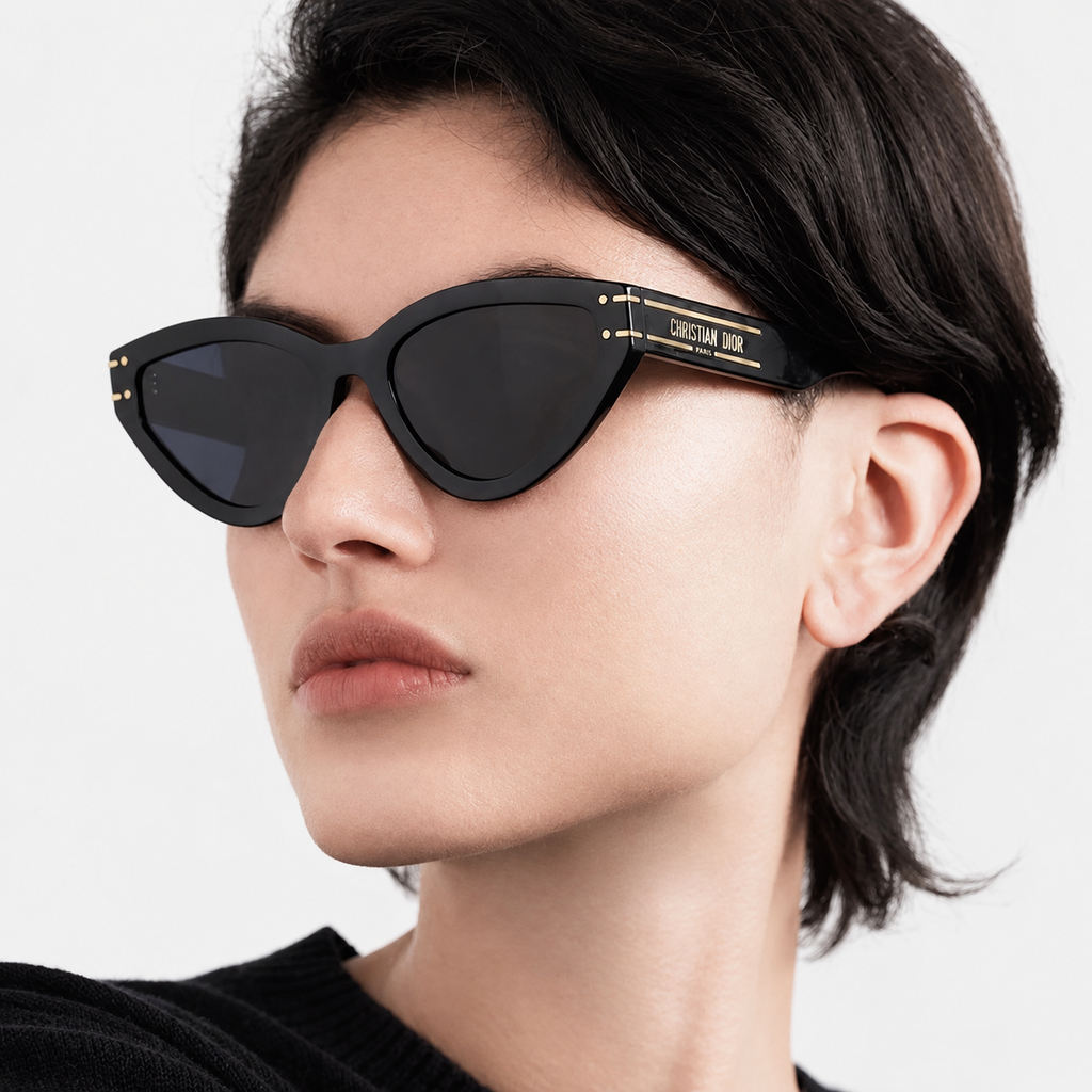 Black sunglasses worn by model