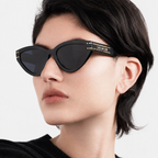 Black sunglasses worn by model