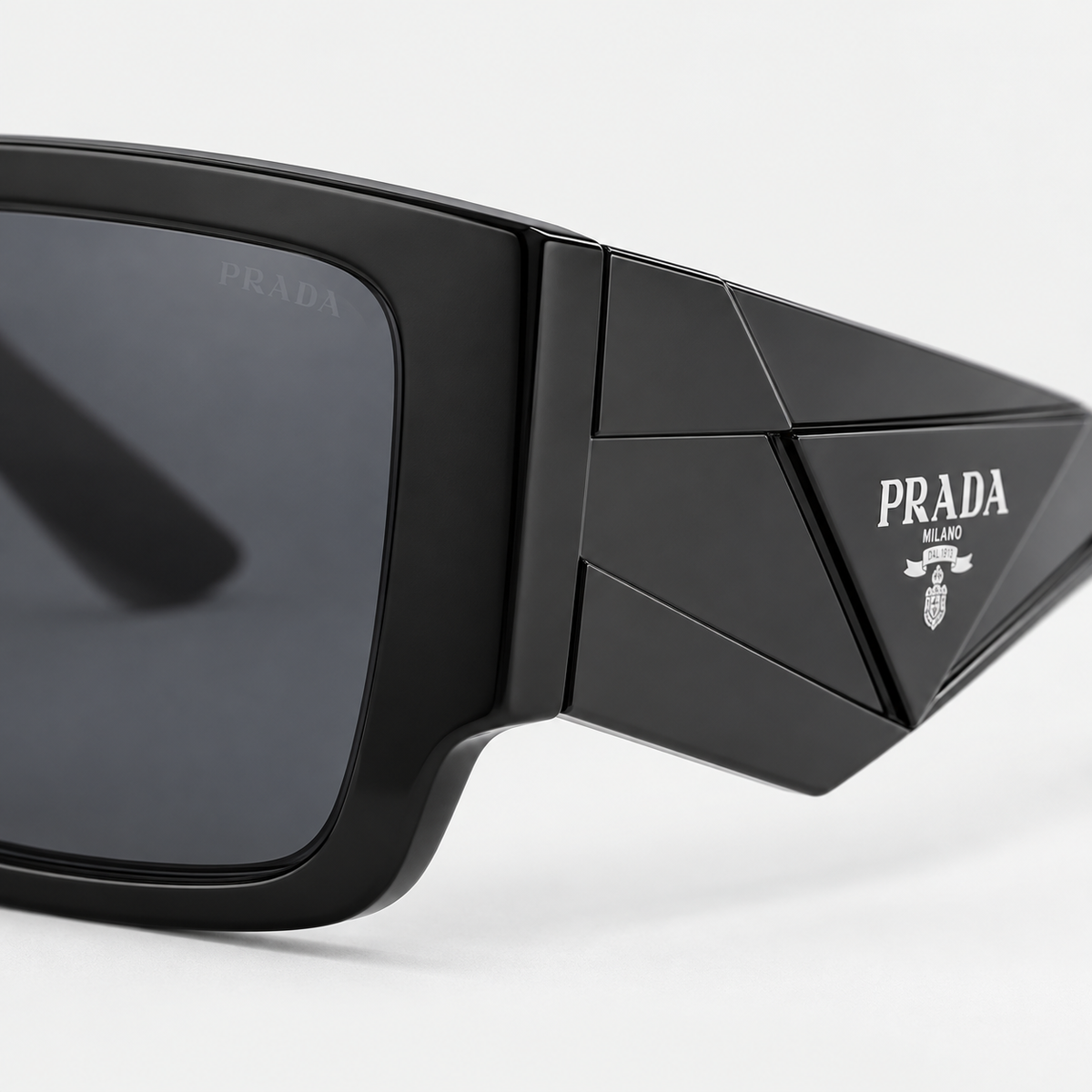 Prada 3220 Sunglasses — temple detail